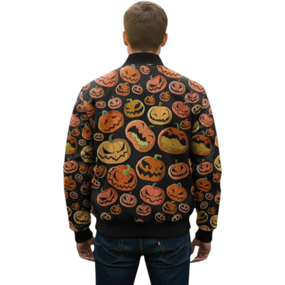 Person wearing a black sweater with Halloween pumpkin pattern on a white background