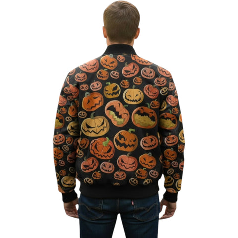 Person wearing a black sweater with Halloween pumpkin pattern on a white background