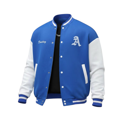 Fit to lead Traders blue and white varsity bomber jacket with snap buttons, ribbed collar, cuffs, and waistband. Features embroidered 'A' and 'Dwelling'.