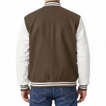 Fit to lead Traders unisex brown varsity jacket with white sleeves, ribbed collar, cuffs, and hem. Classic college streetwear style.