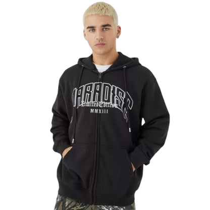 Person wearing a black hoodie with branding on a white background